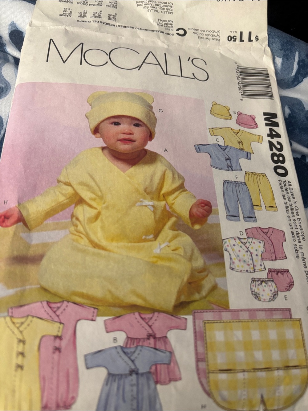 McCall's M4280  for a gown, wrap top, pants, a hat and a blanket.